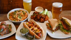 elote tots, jalapeño poppers, hot dog, BBL burger, wings